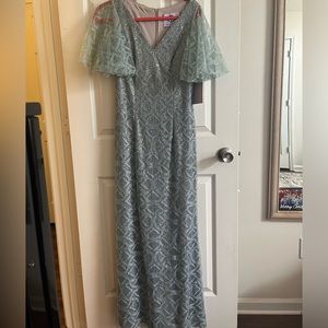 light blue lace dress with purple undertones and sequins. size 4